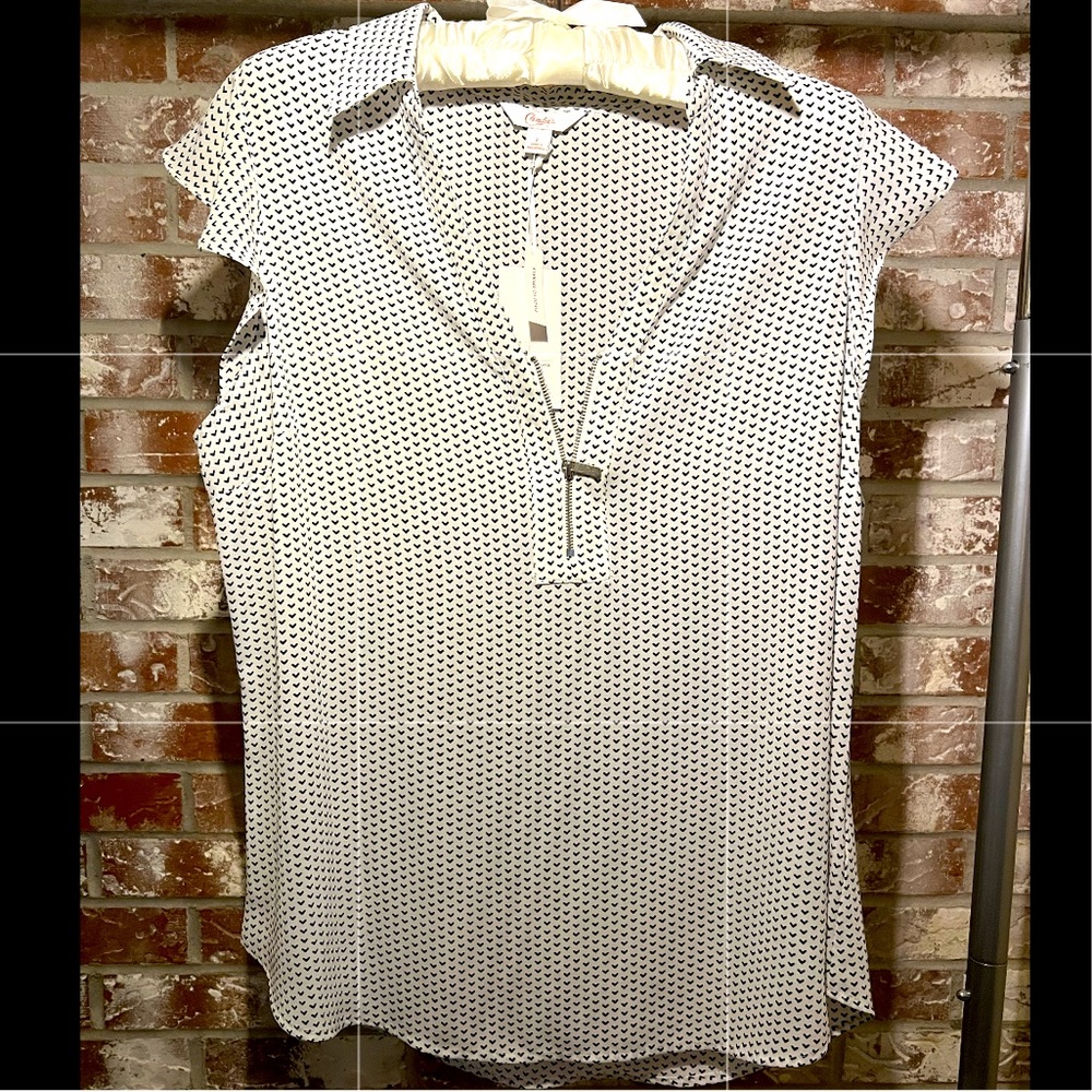 Short sleeved white top with black detail
